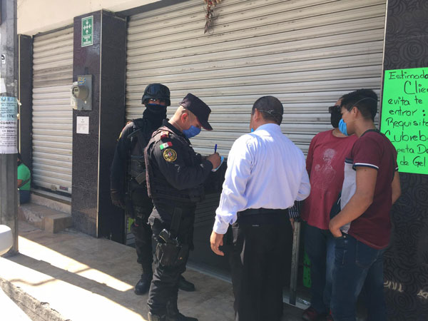 Protestan comerciantes en 15 de Mayo ante amenazas de cierre 2 1 27