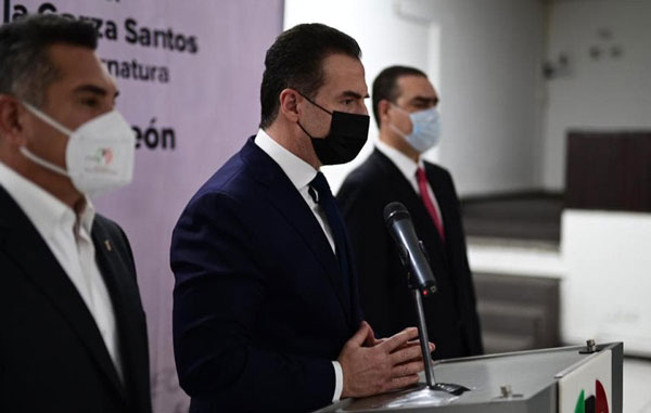 Adrián de la Garza toma protesta como candidato del PRI y PRD 2 adri