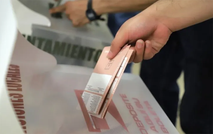 votar