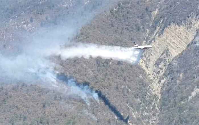 Controlan 80 por ciento de incendio en Santiago 1 SANTIAGO 2