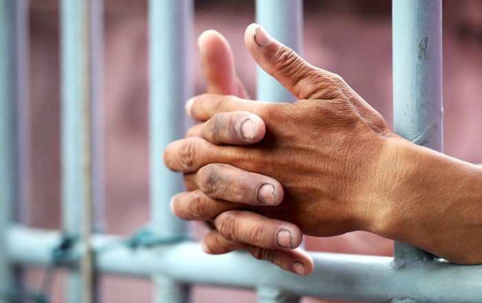 hand in jail