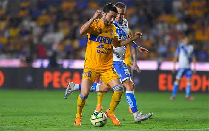 Tigres está en cuartos; vence a Puebla con gol de Córdova 4 TIGRES 2