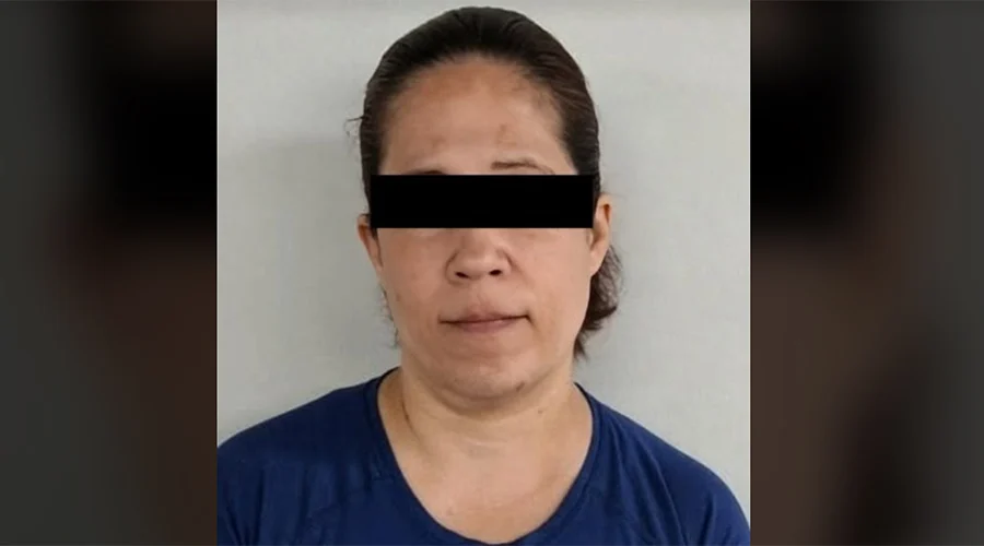 MUJER DETENIDA 89a